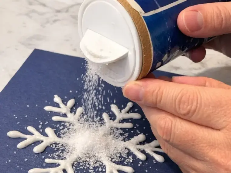 Pour table salt over glue doodles, and the end result is magical