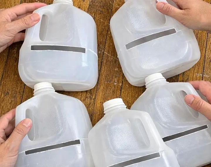 Stack empty plastic milk jugs and slice them this strange way, and the transformation has neighbors stopping to stare